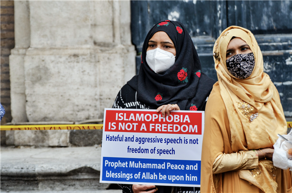Rome 30 october 2020: Members of an Italian Muslim association stage a sit-in and prayer to condemn what they see as persecutory acts against the Islamic community in France via Shutterstock
